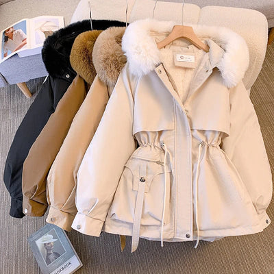 Veste à col fourré avec capuche
